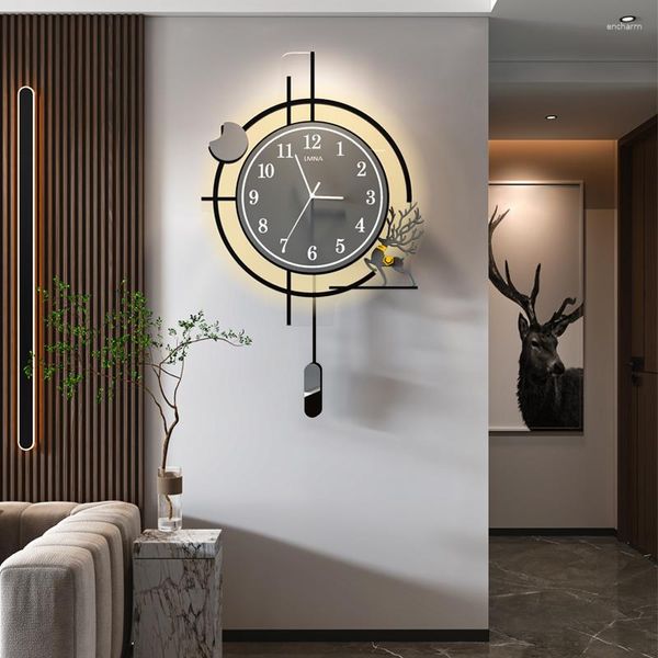 Horloges murales Horloge silencieuse de luxe électronique Art moderne lumineux intérieur nordique rond en métal mural intérieur Relojes de Pared décor à la maison