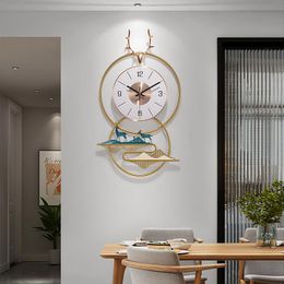 Horloges murales Horloge minimaliste moderne salon maison mode lumière luxe net rouge restaurant atmosphère créative horloge décorative