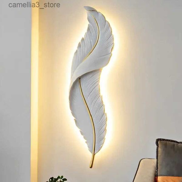 Lámparas de pared Nordic moderno creativo pluma luz LED lámpara de pared dormitorio iluminación de noche sala de estar TV fondo decoración de la pared lámpara de resina Q231127