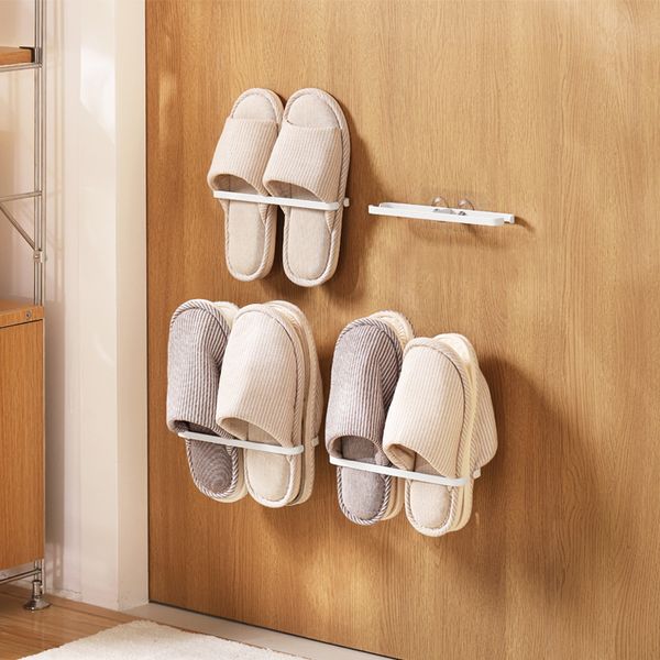 Estante para zapatillas montado en la pared, ganchos para batas, sin perforaciones, fábrica al por mayor, hierro, almacenamiento Simple para baño, almacenamiento de zapatos