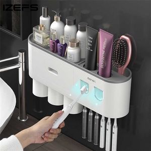 Wall-mounted Toothbrush Holder With 2 Toothpaste Dispenser Punch-free Bathroom Storage For Home Waterproof Bathroom Accessories 211130