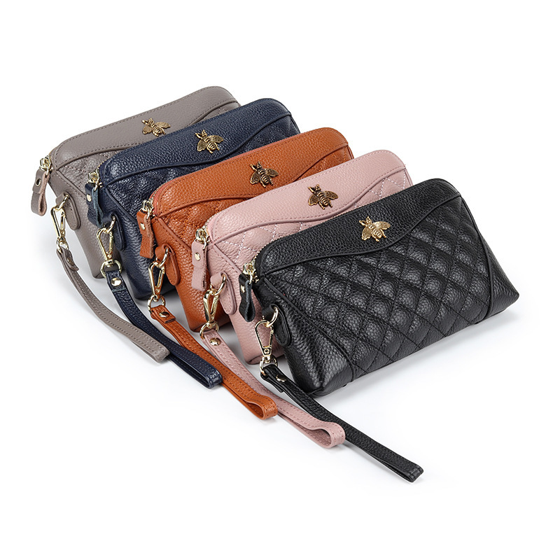 Plånbok första lager kohude handväska kvinnor läder grepp väska enkel mjuk mors mobiltelefon noll lång liten liten