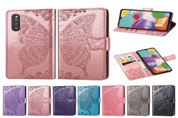 Étui à téléphone de portefeuille pour Samsung Galaxy A41 Butfly de fleur en cuir PU à poussière PU avec machines à main de boucle magnétique Modèles de cartes de cartes à main 1414930
