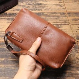 Portefeuilles mode hommes en cuir véritable pochette portefeuille mâle véritable affaires sac à main hommes pratique sac de poignet porte-monnaie pour téléphone