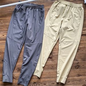 Entrepôt vêtements printemps nouveaux pantalons de contraction de jambe décontractés pour hommes et femmes élastiques pantalons de sport de couple confortables Vente en ligne_FQFI