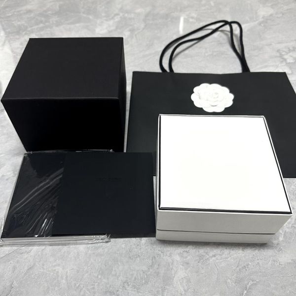 Cajas de reloj Proveedor de fábrica Venta al por mayor Caja Cl original de lujo Terciopelo negro con folleto y tarjeta Estuche de regalo personalizado