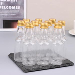 Bouteilles d'eau 10pcs 50ml mini clair PET rechargeable petit vin pour la liqueur de mariage de fête avec couvercle à vis anti-fuite