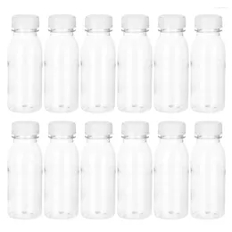 Waterflessen 12 stuks Drinkfles Plastic Sap Subverpakking Doorzichtige container Fruitthee Het huisdier Transparante reisglazen karaf