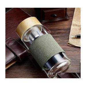 Botellas de agua Botella de vidrio de 400 ml con infusor de té Colador de estilo europeo Resistente al calor Oficina de viajes en automóvil Beber tazas de té Homefavor Dhujz