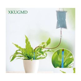 Équipements d'arrosage Sac à eau de jardin Dispositif Matic Forme de broche suspendue Goutte à goutte Flèche Outils d'irrigation des plantes Kit de plantation paresseux Drop Deliver Dhxrq