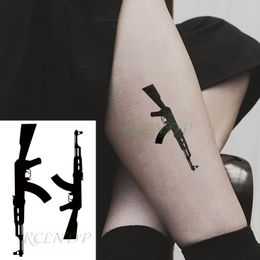 Autocollant de tatouage temporaire étanche noir mitrailleuse tatto flash tatoo faux tatouages pour hommes femmes