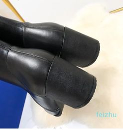 Botas de caballero de cuero encerado Hee grueso Bota de vaquero occidental Moda puntiaguda Medio botines para mujeres diseñadores de lujo zapatos fábrica Calzado