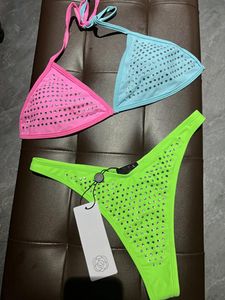 Porter des femmes Knini ensemble maillot de bain nouveau maillot de bain fendu forage chaud Sexy Micro petites couleurs assorties Triangle Bikini