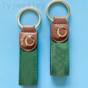 Correas llavero billetera coche llavero de lujo rayas verdes correas lindo cordón llavero para mujer accesorios de moda elegantes letras famosas clásicas pj055