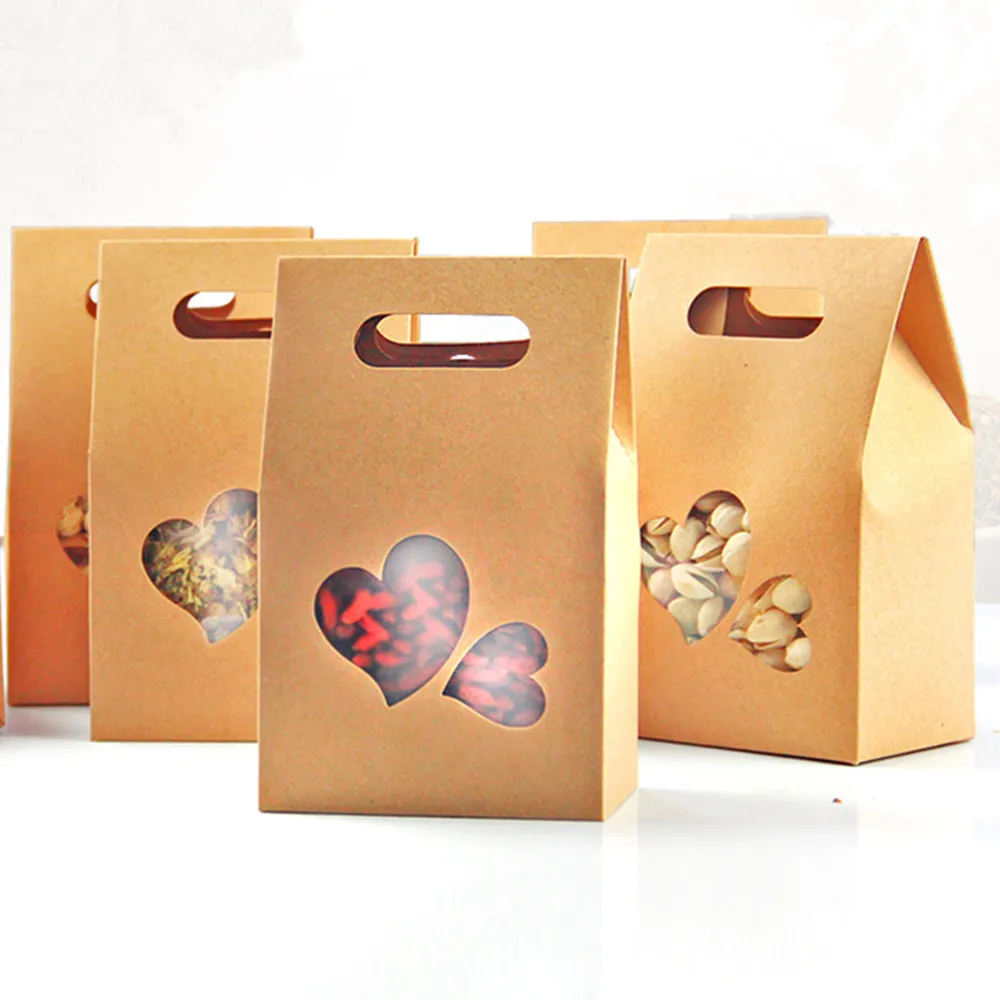 DHL 150 Unids / lote 10.5 * 15 + 6 cm Caja de Papel Kraft Tote Con Mango Ventana de Corazón Claro Bolsa de Embalaje de Regalo Para Favor de Boda Paquete de Chocolate Dulce