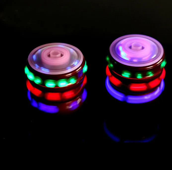 Färgglada Led Light Spinning Top Toy Laser Flash Light Spinning Toppar Spinner Music Song Whipping Top Kids Leksaker Gåvor Gratis Frakt