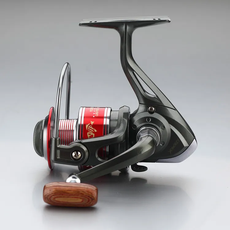 2015 Nyaste fiskerrullar 121 Kullager KF10007000 Series carp 551 växelförhållande Fiske Rulle Metal Rocker Fishing Spinning R8846248