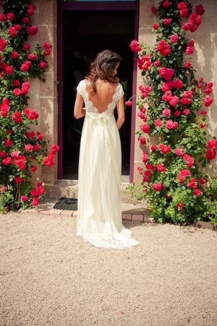 2019 Vintage Bohemian Wedding Dresses A Line Backless Sheer Lace Cap Sleeves Bridal Gowns with V Neck Beaded Sash Country Brides Sweep Train