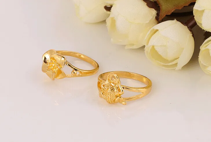 2015 горячие продажи сплава Qiankun позолоченные кольца гибридные модели смешанный размер Леди / девушка мода кольцо подарок на годовщину смешанный стиль 50 шт. / лот