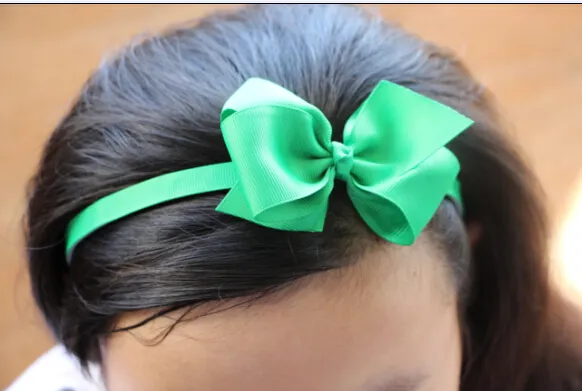Detalle de la moda de la diadema de plástico con el boutique que el pelo del arco de la cabeza de los niños los accesorios para el cabello de los niños 30 unids / lote