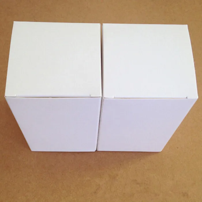 Caja plegable de papel de cartón blanco DIY de 8*8*6cm, caja de embalaje de regalo para adornos de joyería, botella cosmética de aceite esencial de Perfume, té de caramelo de boda