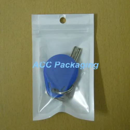 Zipper Lock Plastic Verpakking Tas Wit / Helder Zelfzegel Rits Verpakking Zakken Zakken Hersluitbare Klep Pakket Polybag met Hang Gat