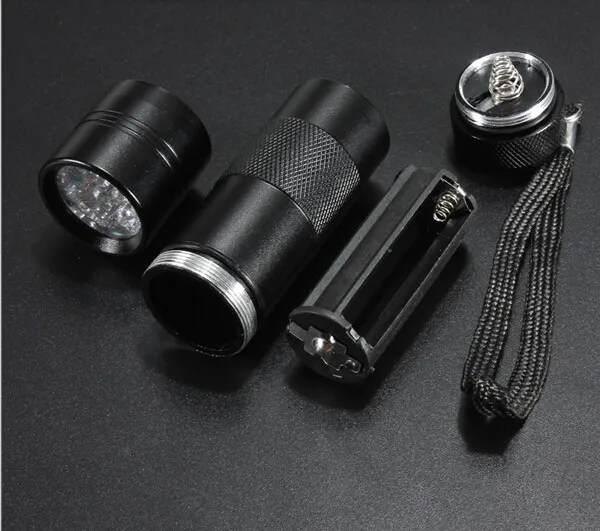 DHL libero, 395-400NM Mini luce ultravioletta UV portatile 12 LED UV torcia elettrica Scorpion Finder Finder luce nera UV-12
