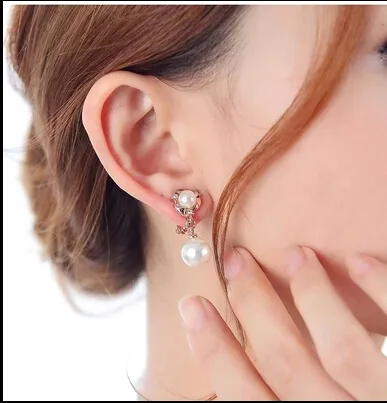 Pendientes de plata de perlas Temperamento femenino Sección larga de los nuevos pendientes de clip de oído Pendientes no perforados 