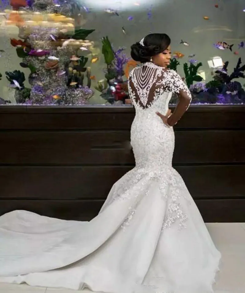 2018 Luxuriöse High Neck Mermaid Brautkleider Besondere Kristalle Sheer Langarm Meerjungfrau Applikationen Braut Brautkleider Vestido De Novia