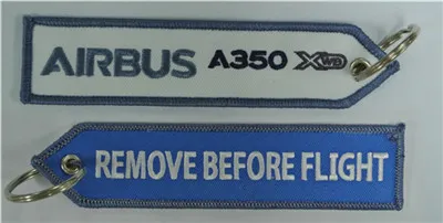 A350 XWB Rimuovi prima dell'anello della catena del bagaglio del volo Etichetta dell'equipaggio di cabina pilota 13,9x3,1 cm 100 pezzi / lotto
