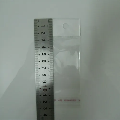 Küçük 4 cm * 10 cm Kendinden Yapışkanlı Şeffaf Plastik Çanta OPP Poli Çanta Kılıfı Asın Delik Hediye Ambalaj Çanta El Sanatları Takı Süsler Yüzükler Küpeler