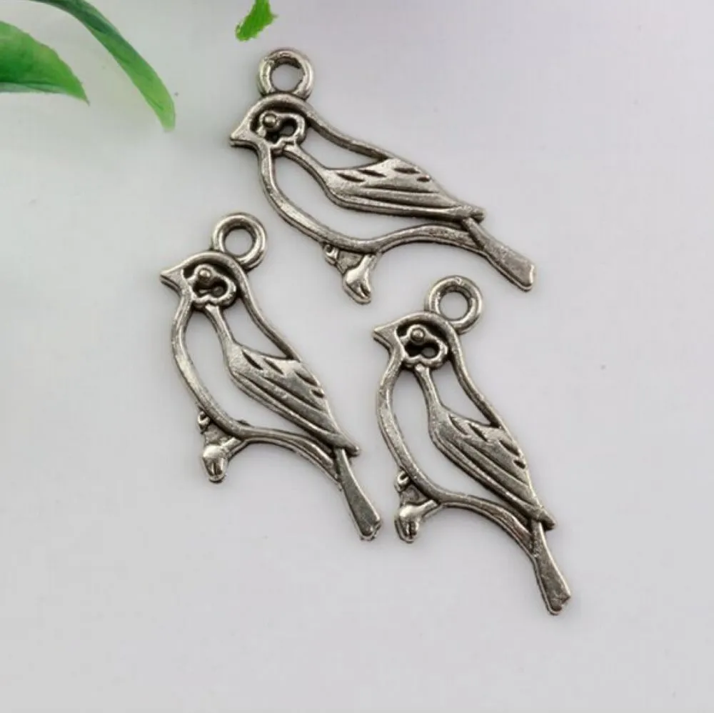 Alloy Hollow Bird Charms Pingentes para fabricação de jóias, brincos, colar e pulseira 17x10mm prata antiga 