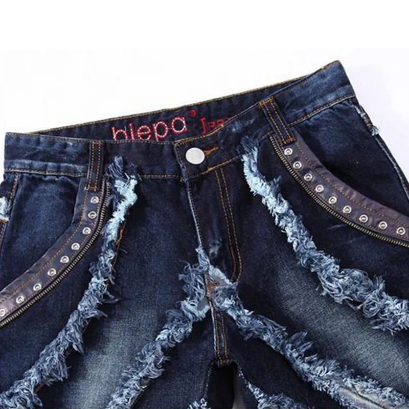 Europei American in stile americano Men039s jeans giunti patchwork lavati graffiati slim jeans dritti jeans rock revival plus size28386925788