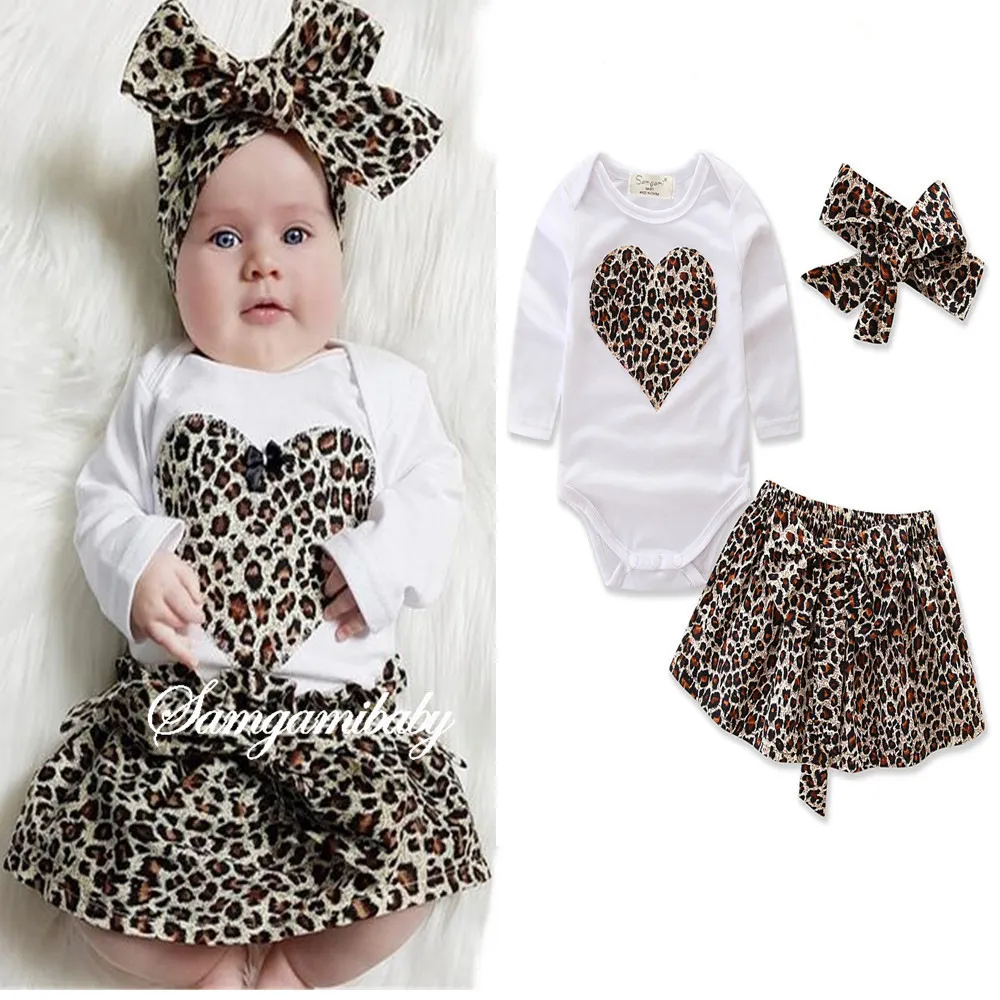 Babykleding Pasgeboren Kid Baby Meisje Luipaard Bloemen Kleding Lange Mouwen Hart Romper Bloemenbroek Hoofdband Outfit Set Van 11 33 DHgate