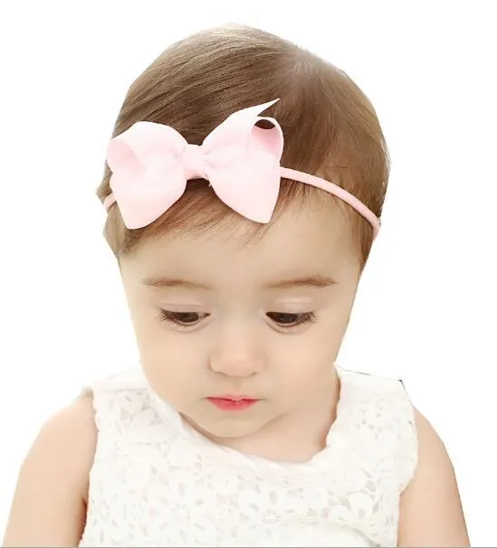 100 pcs/Lot nouveau-né bébé Nylon bandeau 3.2 pouces solide ruban cheveux arc bandeaux enfants arcs élastique bandeaux cheveux accessoires