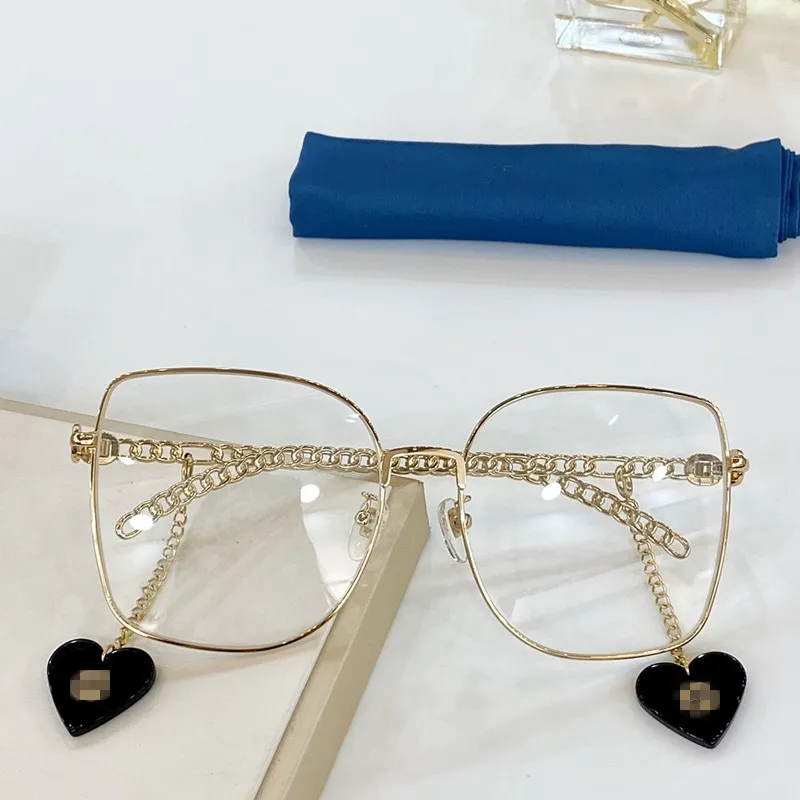 Najnowszy GG0721S Love-Heart Wisiorek Okulary przeciwsłoneczne dla kobiet UV400 60-18-135 Metalowa noga łańcuchowa + jednorazowa dekoracja fulletset futerset