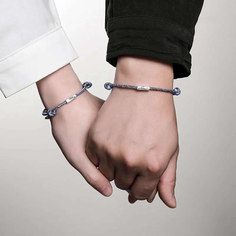 Coppia bracciali infinito uomo donna con ciondoli ancora e timone