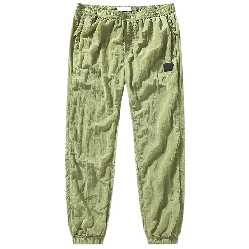 Vêtements pour hommes marque pantalons printemps et automne nouveau Style métal Nylon hommes pantalons de sport Leggings mode