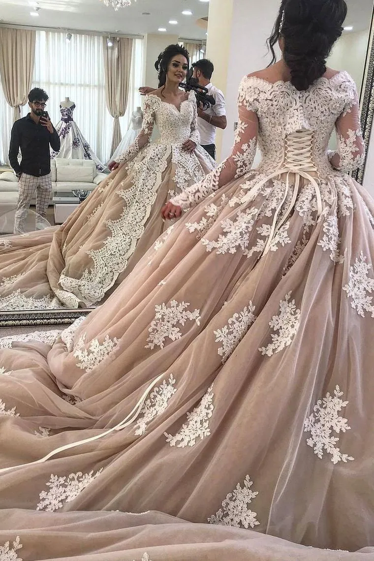 Luxury Off-Shoulder Champagne Ball Gown pakistani wedding dresses online with Long Sleeves, Lace-Up Bridal Goggles, Appliques, and Long Train from