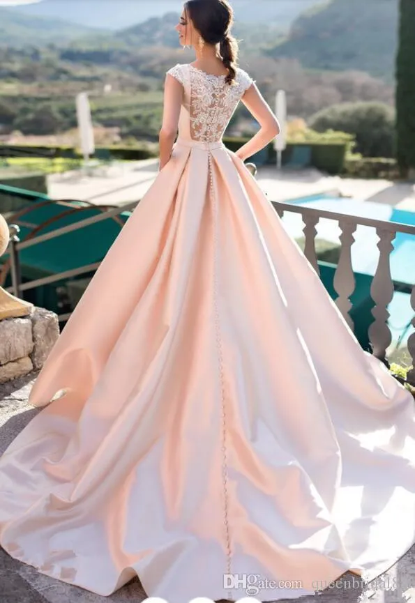 Blush wedding dress with on sale pockets