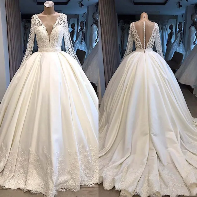 Modesta ilusão de manga comprida bola vestidos de casamento Vestido de 2.019 V Neck Sem Costas Com botões forrados Mergulhando Dubai Árabe Vestido de Noiva