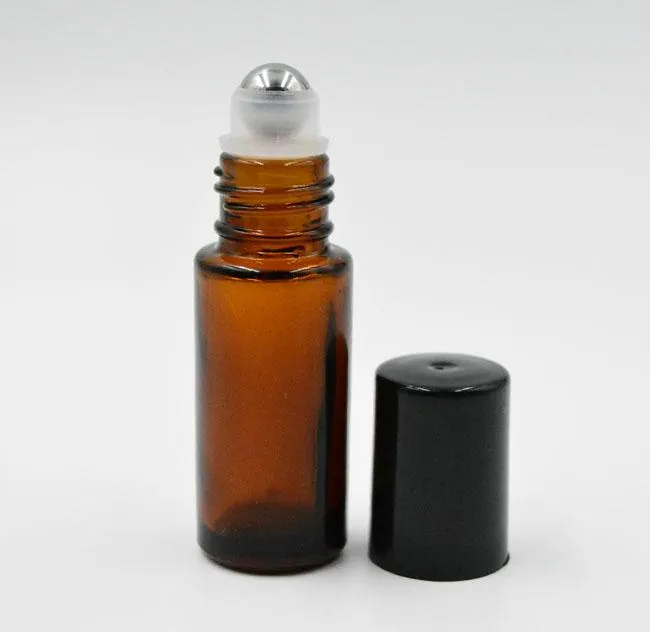 ガラスの瓶の上の厚い琥珀色の詰め替え可能な5mlのミニロールエッセンシャル油鋼の金属ローラーボールの香り香水