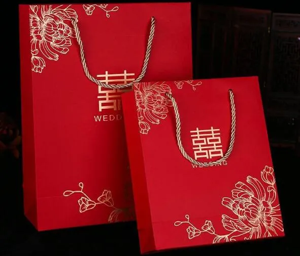 100 pcs/lot style chinois rouge Double bonheur sacs-cadeaux en papier pour sac d'emballage de mariage avec poignée faveurs de fête