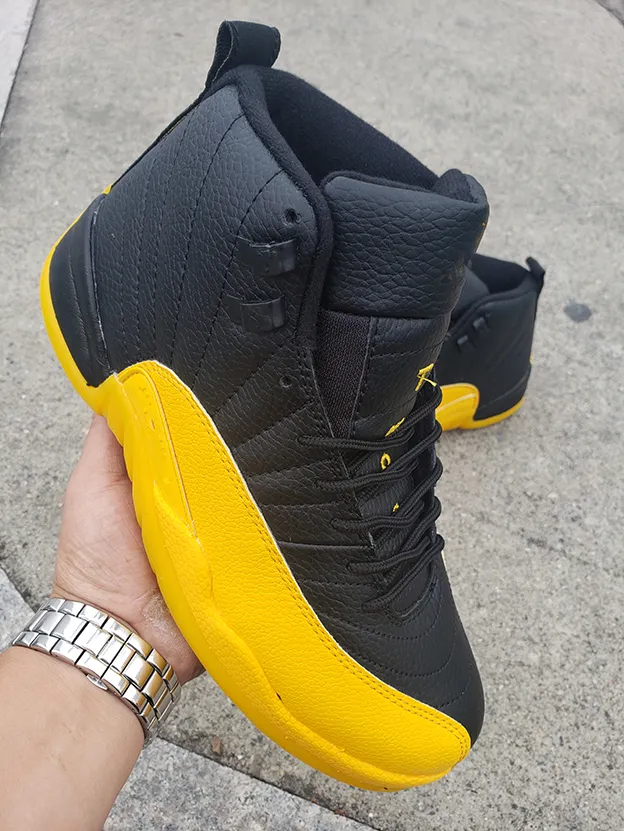Black yellow 12s sale