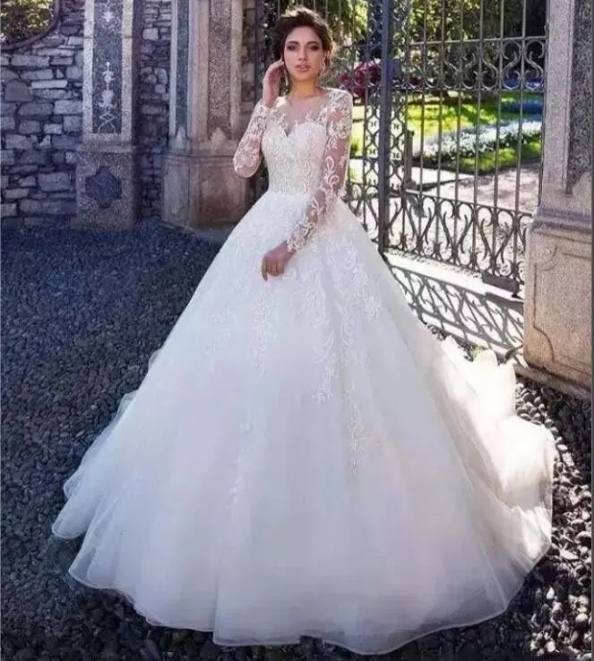Primavera 2020 Últimas vestidos de noiva Lace Appliqued Illusion Neck Sheer mangas compridas A Linha Branca Organza vestidos de casamento formal Atacado