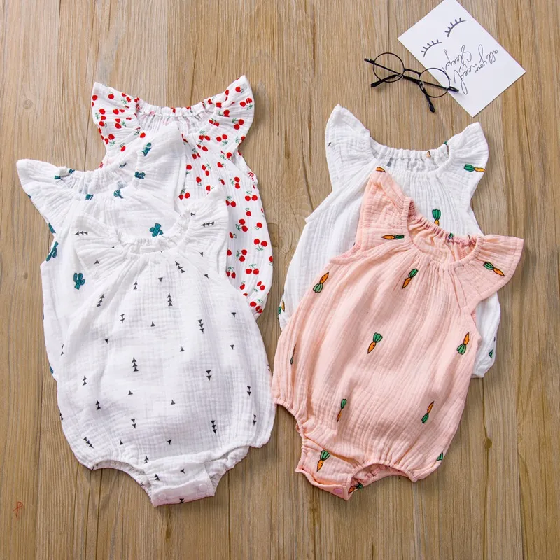 Linne Bomull Baby Girls Fly Syle Rompers Nyfödd Spädbarn Linne Jumpsuits Sommar Tecknad Patron Boutique Barn Klättring Kläder M1672