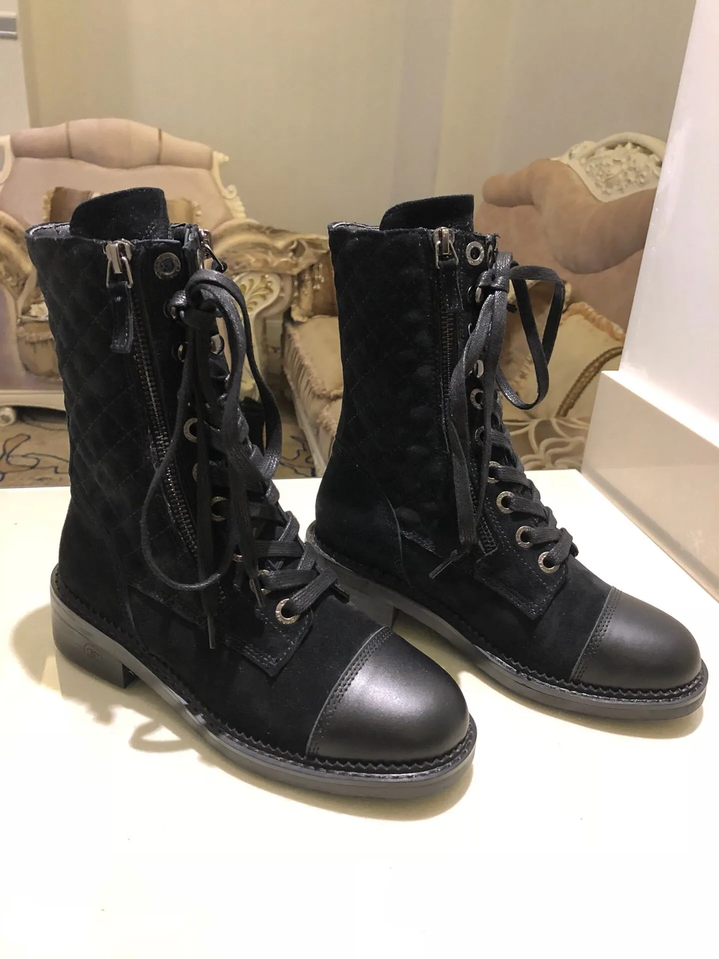 Boots chanel femme sales