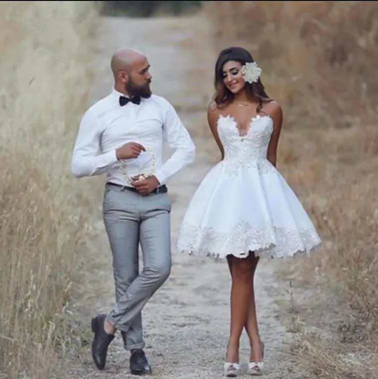 Handmade Lace Beach Wedding mini Wedding dress with Sweetheart Neckline and Appliques - Custom Size A-Line Bridal Gown for a Chic and Romantic Look Handmade Lace Beach Wedding mini Wedding dress with Sweetheart Neckline and Appliques - Custom Size A-Line Bridal Gown for a Chic and Romantic Look