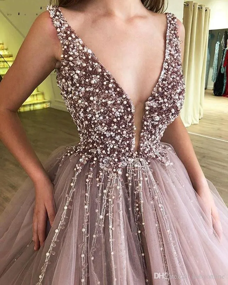 Roze baljurk Quinceanera jurken kralen kristallen diepe v nek gezwollen zoete 15 prom jurken vestidos de avondjurk vestidos de quinceañera