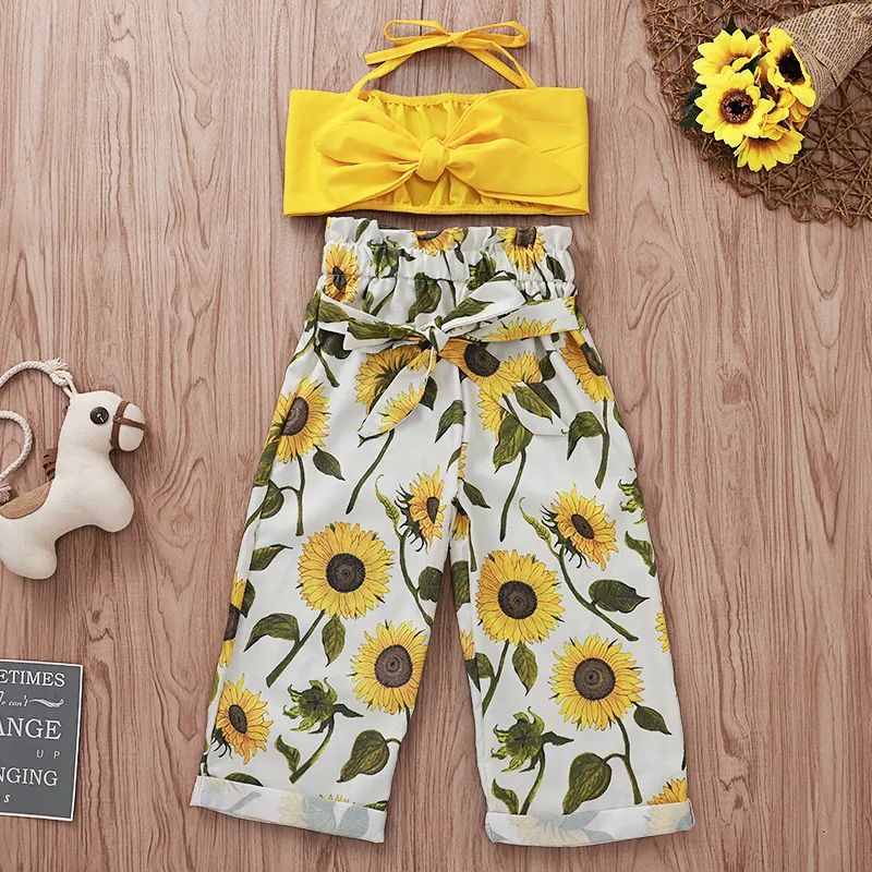 Los Apoyos De Las Muchachas De Las Tapas Girasol Pierna Ancha